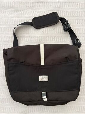 cotopaxi Black Messenger Bag with Cream Stripe